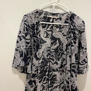 Blue and White Patterned wrap dress slight sheer